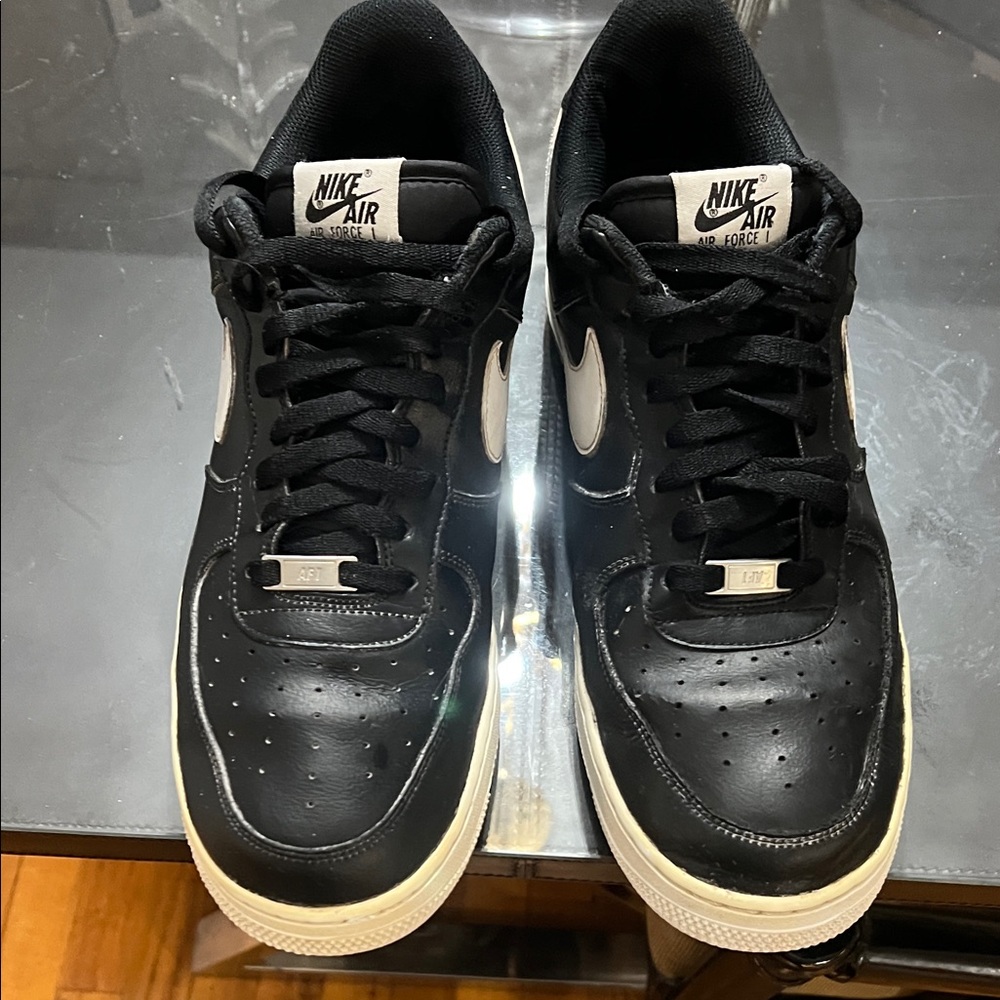 Nike Air Force 1 Black w/White Accents mens size 12. in used but VG condition.